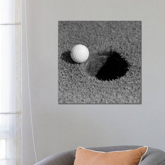1950s Close-up of Golf Ball on Green on Very Edge of Cup by Vintage Images - Wrapped Canvas Photograph (66.04cm H x 66.04cm W x1.91cm D)
