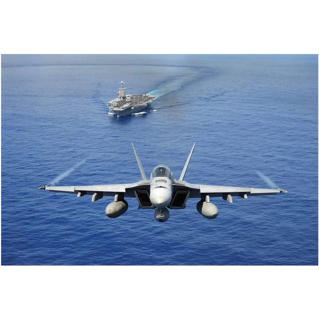 An F/A-18E Super Hornet Flying Above USS John C. Stennis by Stocktrek Images - Wrapped Canvas Photograph (20.32 cm H x 30.48 cm W x 1.91 cm D)