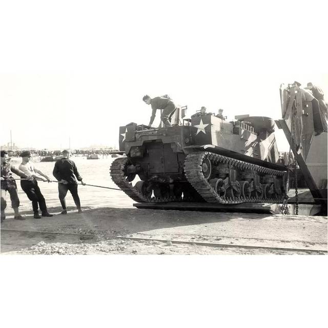 US Army M7 Howitzer Motor Carrier Being Unloaded in Algiers by Stocktrek Images - Wrapped Canvas Photograph (20.32cm H x 30.48cm W x 1.91cm D)