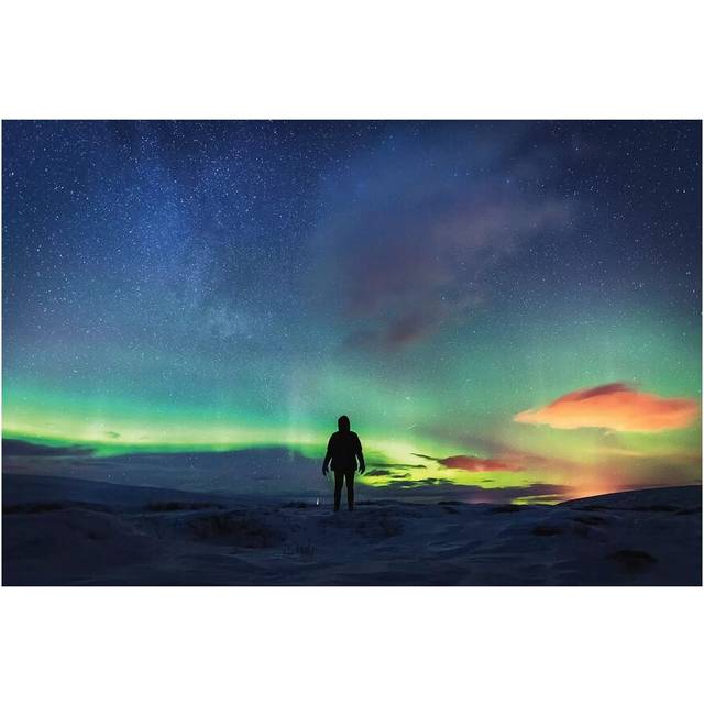 Silhouetted Man with Aurora Northern Lights by James Vodicka - Graphic Art Print on Canvas - Wrapped Canvas (20.32cm H x 30.48cm W x 1.91cm D)