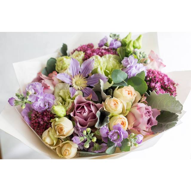 Close-up Floral Composition with Roses and Mix Flowers on a Light Background by Malkovstock - Wrapped Canvas Photograph (81cm H x 122cm W x 3.8cm D)