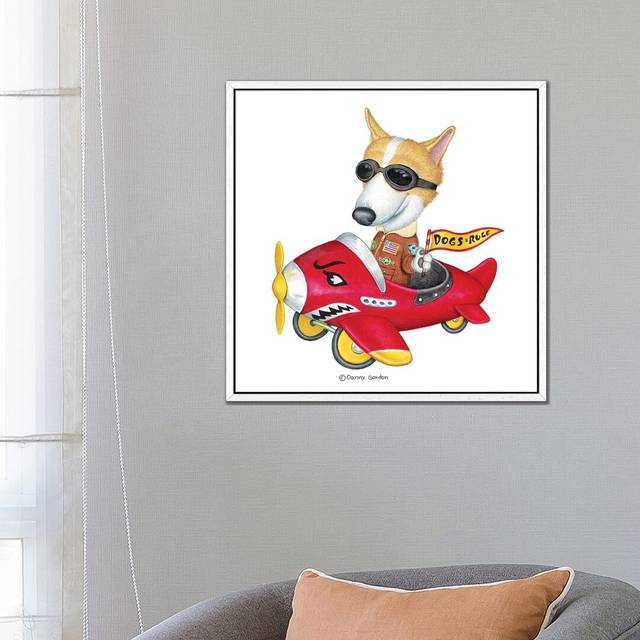 Corgi In Red Plane by Danny Gordon - Graphic Art on Canvas - White Floater Frame (66.04cm H x 66.04cm W x 3.81cm D)