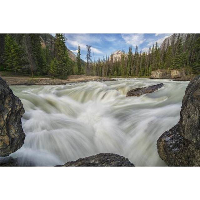 The Kicking Horse River Flows Over A Waterfall Before It Goes Beneath A Natural Bridge Yoho National Park Poster Print - 38 x 24 in. - Large