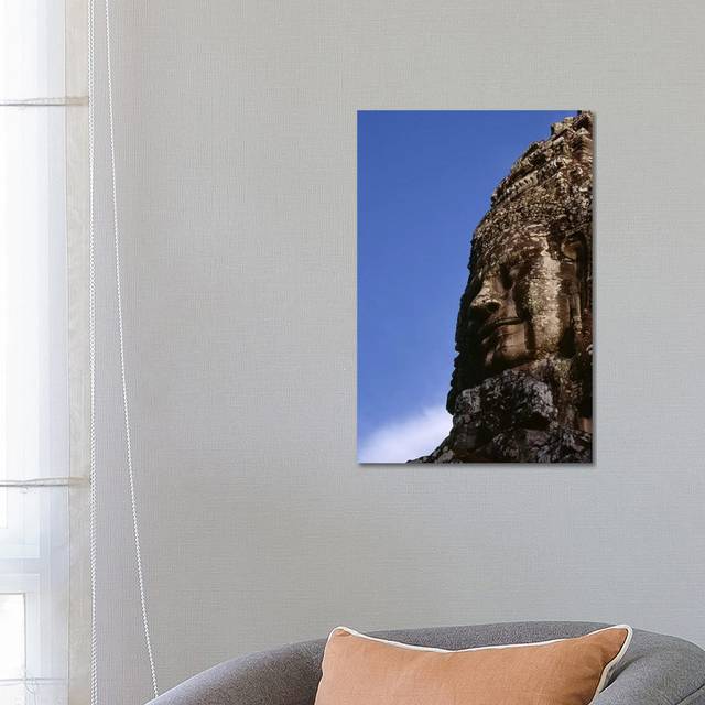 Low Angle View of a Face Carving - Wrapped Canvas Photograph (26cm H x 18cm W x 2cm D)