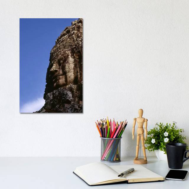 Low Angle View of a Face Carving - Wrapped Canvas Photograph (12cm H x 8cm W x 1cm D)