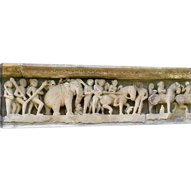 Sculptures Detail of a Temple, Khajuraho, Chhatarpur District, Madhya Pradesh, India by Panoramic Images - Wrapped Canvas Panoramic Photograph (30.48cm H x 91.44cm W x 1.91cm D)