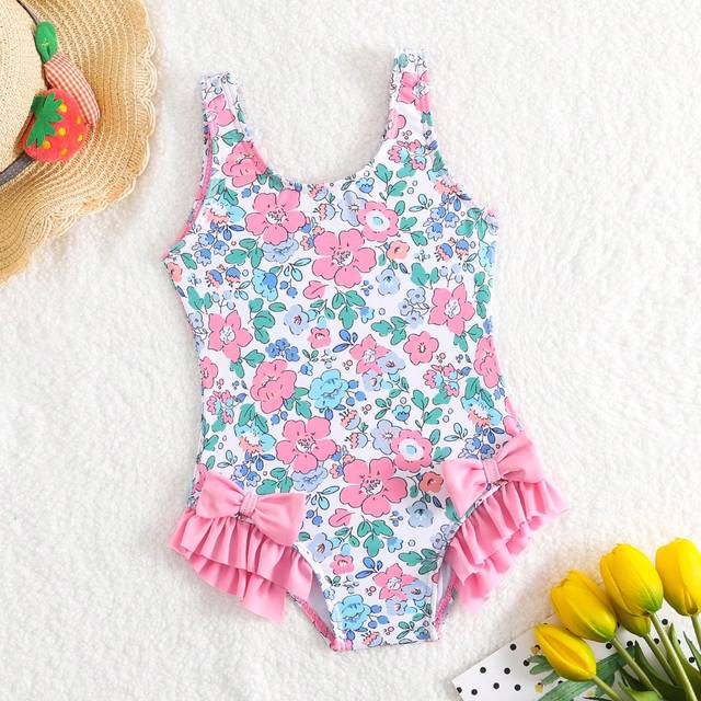 SHEIN Baby Girl Random Printed Swimsuit With Bowknot Decoration And Ruffled Hem, One-Piece