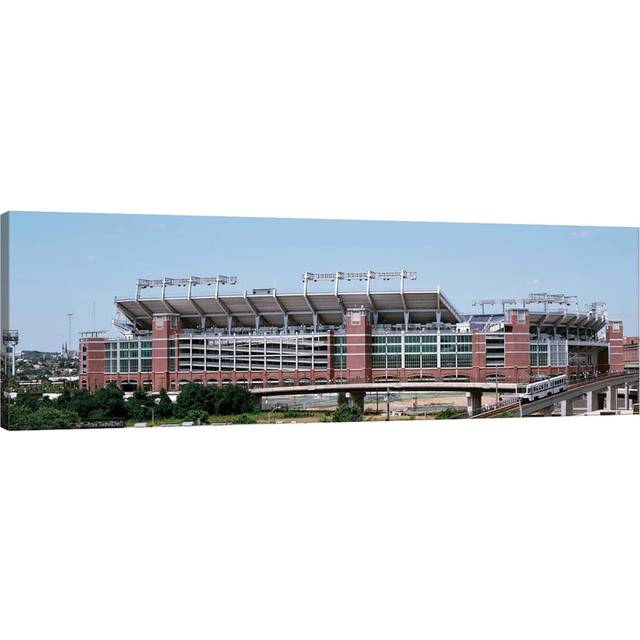 Cable Car Passing by A Stadium, M&T Bank Stadium, Baltimore, Maryland, Usa by Panoramic Images - Wrapped Canvas Panoramic Wrapped Canvas (60.96cm H x 182.88cm W x 3.81cm D)