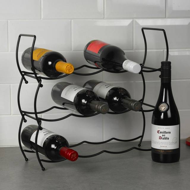 Loscalzo 12 Bottle Metal Floor Wine Bottle Rack in Black (15cm H X 43cm W X 14cm D)