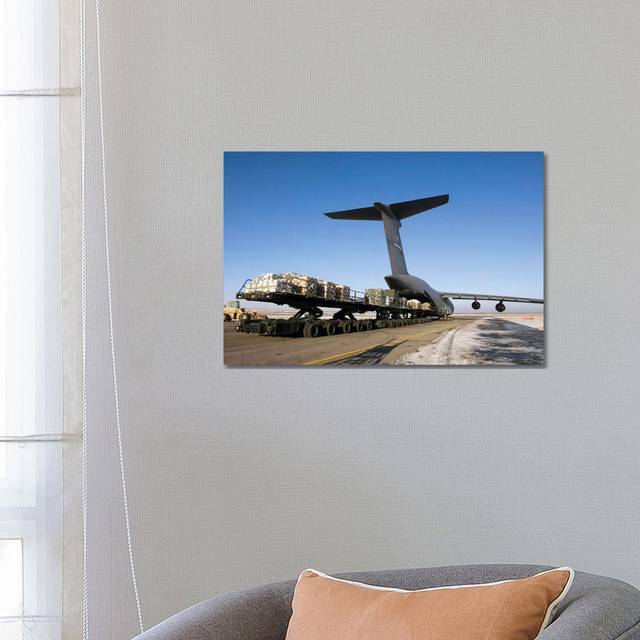 Pallets Await Loading onto a C-5 Galaxy - Wrapped Canvas Photograph (66.04 cm H x 45.72 cm W x 1.91 cm D)
