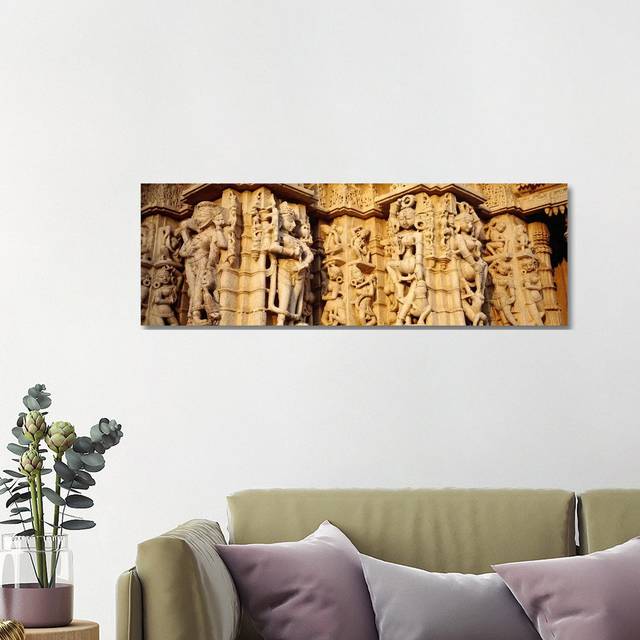Sculptures Carved on a Wall of a Temple, Jain Temple - Wrapped Canvas Panoramic Photograph (40.64cm H x 121.92cm W x 1.905cm D)