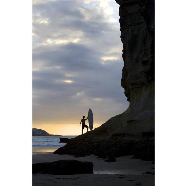 A Surfer On Muriwai Beach New Zealand Poster Print by Deddeda, 11 x 17