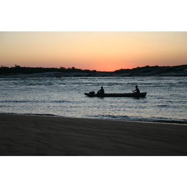 Fishermen in the Amazon Photograph by Wonderlandproductions - Wrapped Canvas Photograph (81cm H x 122cm W)