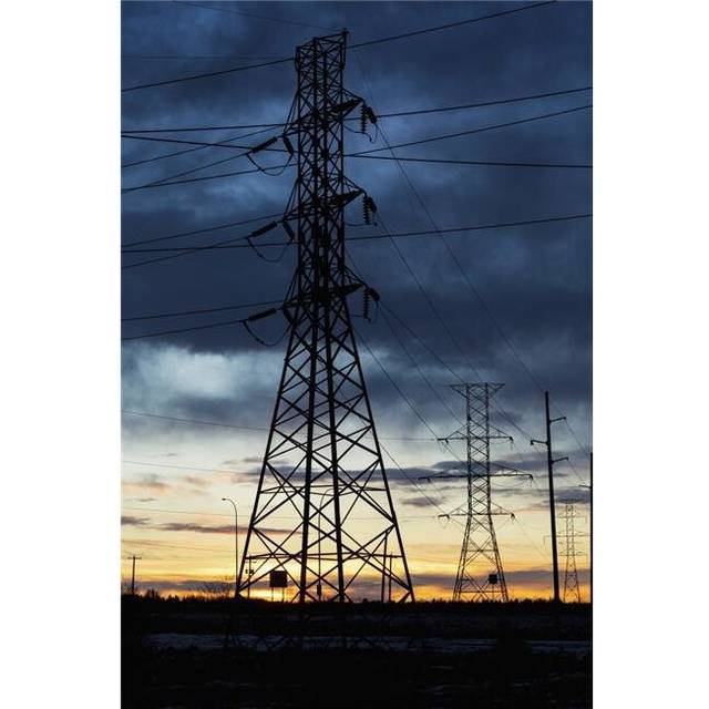 Silhouette of Large Metal Powerline Towers with Glowing Sky - Calgary Alberta Canada Poster Print - 12 x 19 in.