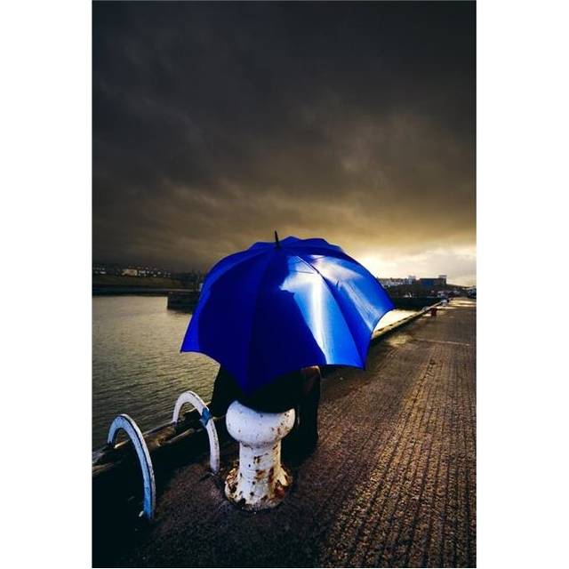Person with Umbrella in Stormy Skies Poster Print by John Short, 24 x 36 - Large