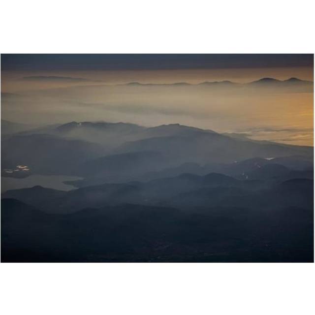View of Mountains & Clouds At Sunset Along The Coastline - Greece Poster Print by Reynold Mainse, 38 x 24 - Large