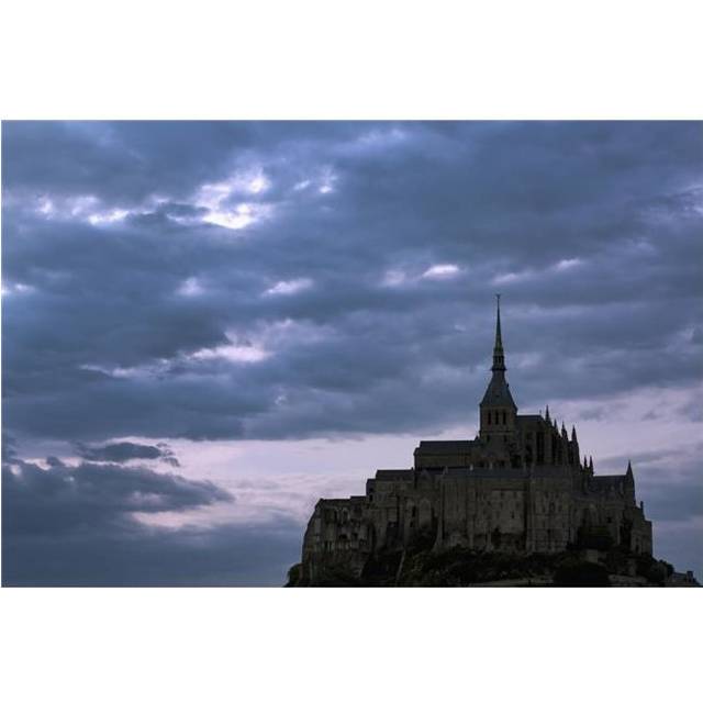 Silhouette of Large Stone Abbey Perched on Rocky Hill with Dramatic Clouds at Sunset Poster Print - 38 x 24 in. - Large