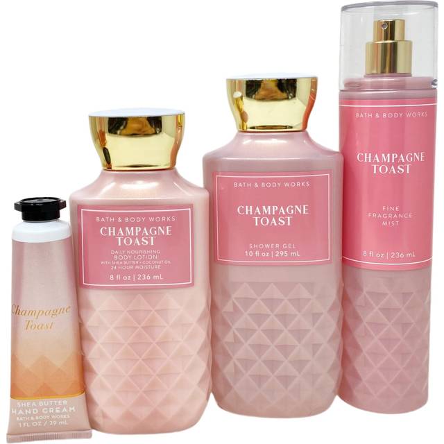 Bath and Body Works CHAMPAGNE TOAST Gift Bag Set - Body lotion - Shower Gel and Fine Fragrance Mist Plus a Shea Butter Hand Cream arranged inside