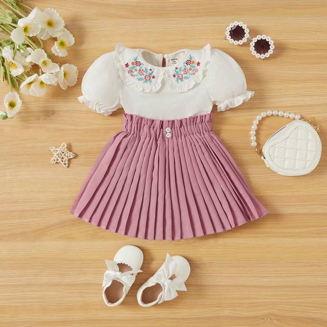 SHEIN Baby Girl Summer Adorable Knitted Floral Pattern Peter Pan Collar Short Sleeve Top & Solid Pleated Skirt Set