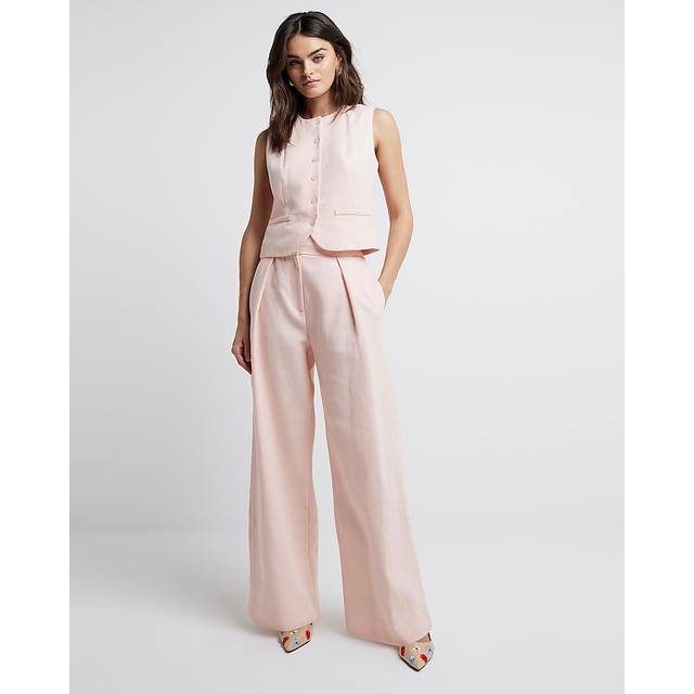 River Island – Ljusrosa, plisserade byxor med vida ben