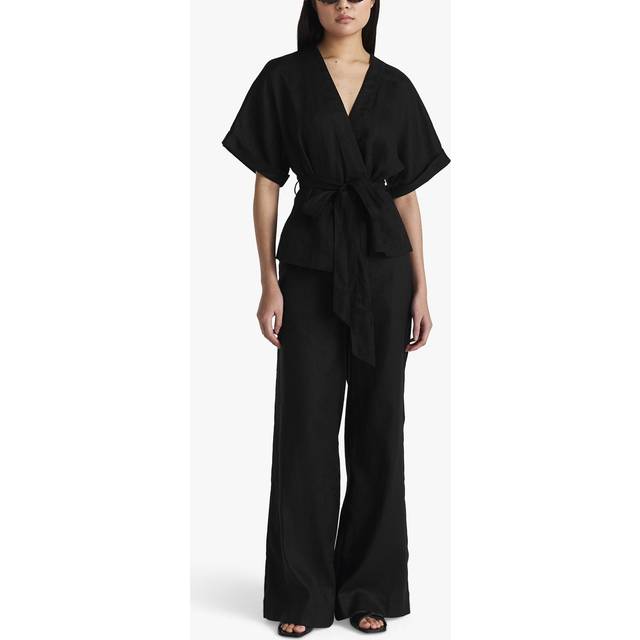Reese Linen Wrap Top - Black - Craft your capsule wardrobe with everyday basics and denim designs from Swedish brand Twist and Tango. Effortlessly fusing ease and style, each timeless piece is sure to transcend seasons and become favourites in your daily edit.