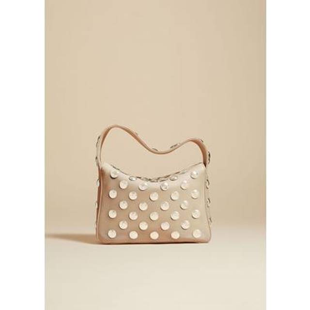 Elena Small Shoulder Bag - Dark Ivory - New York-based brand Khaite offer a range of expertly crafted accessories sure to become key in your daily edit. From structured cuts to slouchy everyday styles, the range features classic to more contemporary silhouettes, all proudly finished with the brand's logo.