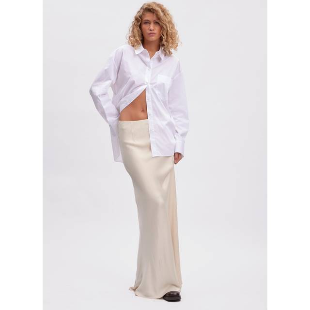 Lidaya Logo Skirt - Birch - Founded in 2008 by Sanne Sehested, Gestuz is a contemporary Danish fashion brand known for its effortlessly chic and modern aesthetic. The label seamlessly blends Scandinavian minimalism with bold, vintage-inspired designs to create pieces that are both timeless and on-trend. Whether it's sleek tailoring, statement outerwear, or everyday essentials, you are sure to find something that will portray your individuality with confidence and style.