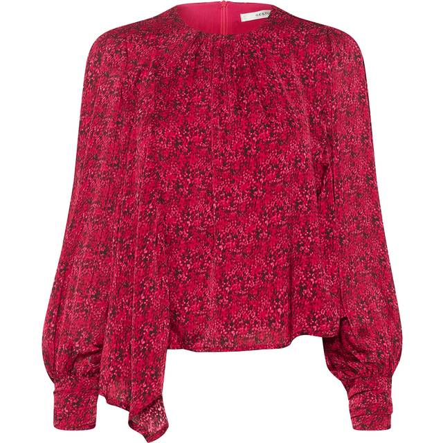 Deepa Floral Blouse - Pink Ditsy Flower - Founded in 2008 by Sanne Sehested, Gestuz is a contemporary Danish fashion brand known for its effortlessly chic and modern aesthetic. The label seamlessly blends Scandinavian minimalism with bold, vintage-inspired designs to create pieces that are both timeless and on-trend. Whether it's sleek tailoring, statement outerwear, or everyday essentials, you are sure to find something that will portray your individuality with confidence and style.