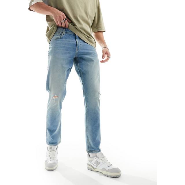 ASOS DESIGN – Ljusblå, stretchiga, smala jeans med slitna detaljer