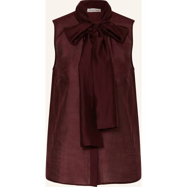 Saylor Pussybow Blouse - Burgundy - Phase Eight offers inclusive collections, with each style expertly created by the in-house team of designers. Daily basics and occassionwear can be found across each line, with hand-drawn prints adorning many of the brands creations. With versatility and sophistication in mind, you are sure to find a piece that you will continue to reach for year after year.