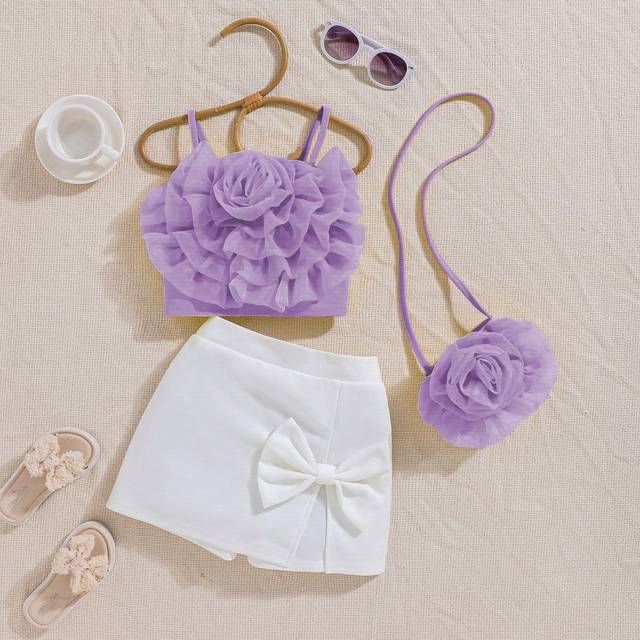 SHEIN Young Girl&#39;s Summer Fashion 3D Flower Strap Top With Bowknot Decorated Skirt Shorts Set