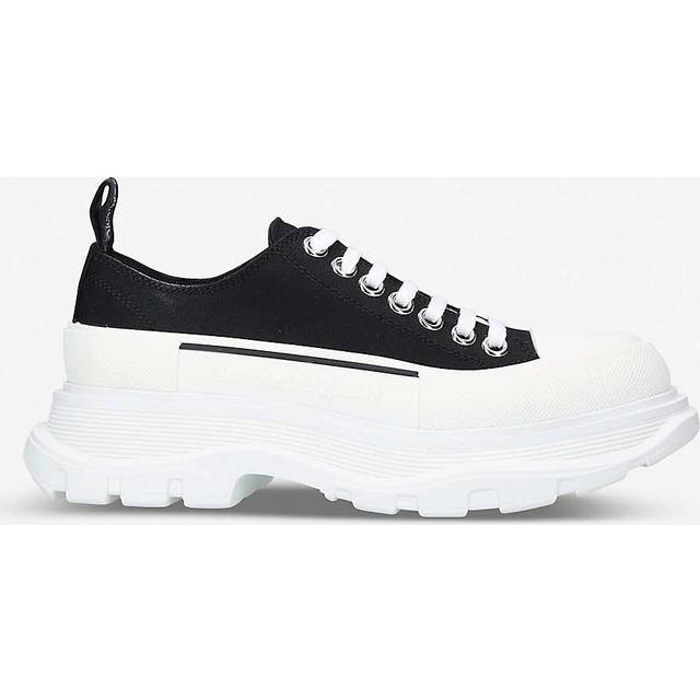 Tread Slick Chunky Trainers - BLACK - Channel the nineties with the Tread Slick trainer from Alexander McQueen. Black suede lace up with a signature branded loop ribbon and oversized rubber tread sole, they are sure to elevate your trainer game.