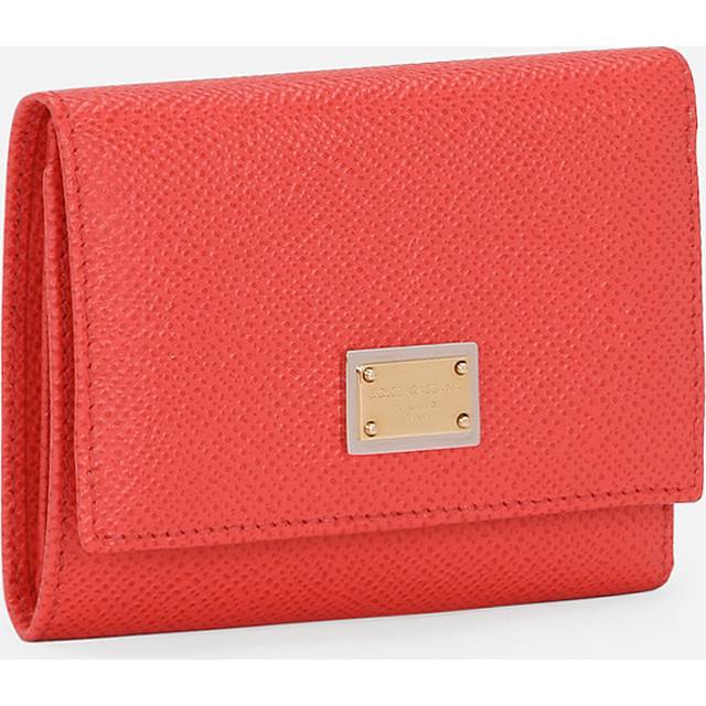 Wallet with an engraved logo application