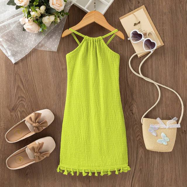 SHEIN Girls&#39; Casual Woven Textured Fabric Fringe Hem Halter Neck Dress. The Woven Textured Fabric Adds A High-Quality Feel And Elegant Design To The Dress.