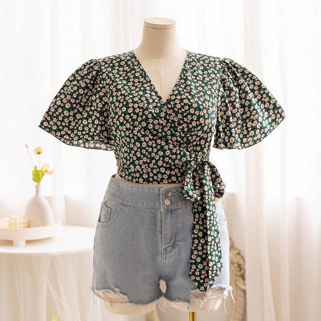 Soleia Plus Size Women&#39;s Boho Holiday Daisy Printed Short Sleeve Blouse With Cross V-Neck And Side Tie Detail, For Summer
