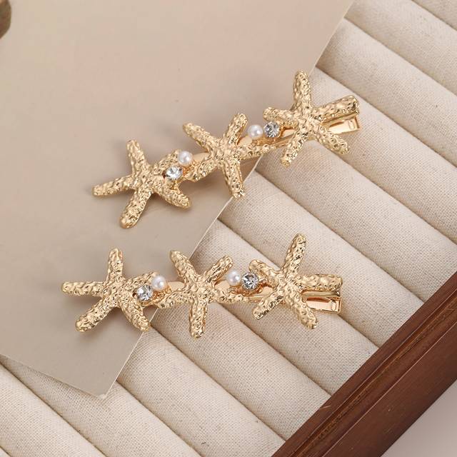 SHEIN 2pcs Metal Starfish Clip Simple Versatile Decorative Hair Clips Claw Clips Hair Claws Hair Barrettes, School Stuff