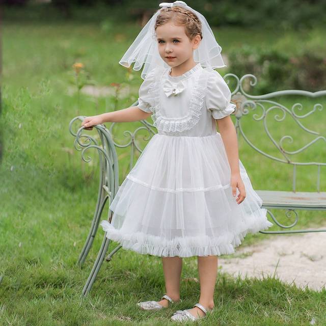 SHEIN Elegant White Dress For Young Girls. The Dress Features Puff Sleeves, Adding A Touch Of Sweetness And Playfulness To The Overall Look. The Lace Design