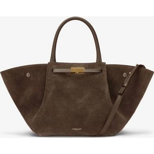 New York Midi Suede Tote Bag - Mocha - Founded in 2017 with a vision of empowerment, DeMellier's creations are designed in London and handcrafted by artisans in Europe. Blending heritage and modernity, the name reflects founder Mireia’s Spanish and French roots, capturing tradition and innovation in every design.