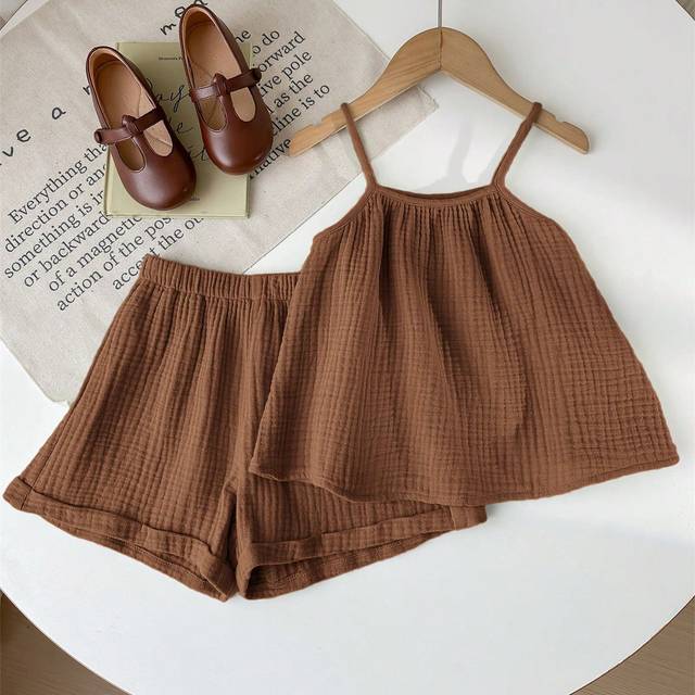 SHEIN LMoss Young Girl&#39;s Summer Simple Casual Loose Camisole Top With Spaghetti Straps And Folded Hem Shorts, 2pcs/Set