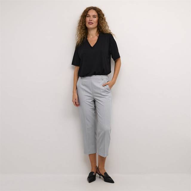 Sakura Cropped Tailored Trousers - Grey Melange - Danish brand KAFFE has been offering timeless collections adorned with feminine details since 1993. The label offers a range of versatile, minimalistic styles that look and feel great, making your daily edit stylish and effortless.