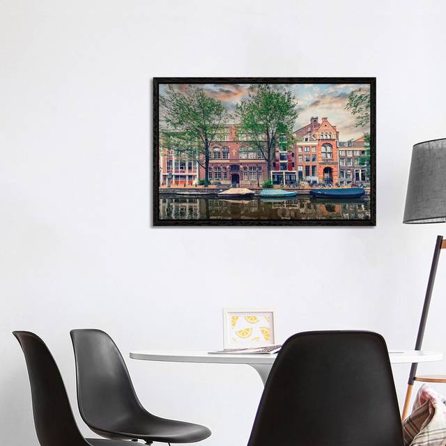 Amsterdam In The Evening by Manjik Pictures - Gallery-Wrapped Canvas Giclée on Canvas - Black Floater Framed (66.04cm H x 101.6cm W)