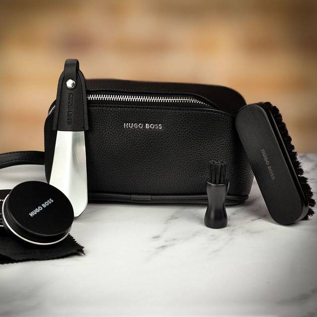 Shoe-care kit in grained faux-leather bag