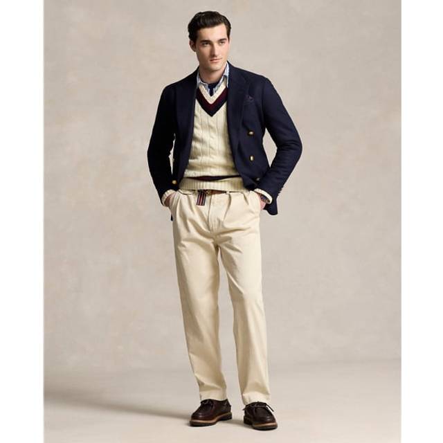 Whitman Pleated Chinos - Biscuit Tan - All-American label Polo Ralph Lauren is defined by its preppy aesthetic. Built on the brand's sporting heritage with East Coast inspired design, each collection is brimming with clean cuts, signature motifs and, of course, that pony logo.