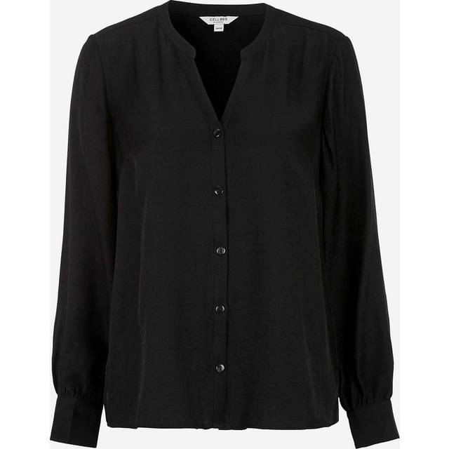 Vävd blus med knappar