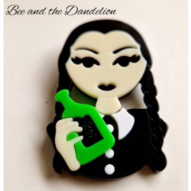 Layered acrylic 3d brooch spooky girl with poison bottle.