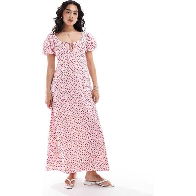 ASOS DESIGN – Prickig tea-klänning i midilängd med puffärm-Flera