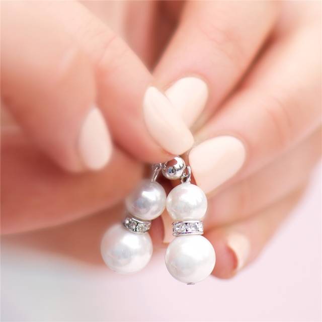 Crystal Pearl Drop Earrings - SILVER - Create a statement when wearing these natural shell pearl earrings with clear crystal stone detailing, adding a touch of sparkle and bringing class and elegance to your outfit. Inspired by the world's oldest gem, these vintage style earrings from Newbridge Silverware will allow you to express your femininity through its refined design.