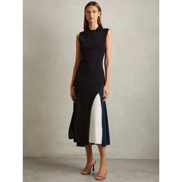 Faro Colourblock Dress - BLACK - Beginning with men's tailoring in 1970's London, Reiss' design philosophy has endured for over five decades, maintaining the distinctive tailoring, sharp cuts, and contemporary prints it has become famous for to create investment pieces destined to stay in your wardrobe for seasons to come.