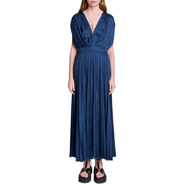 Draped Backless Dress - NAVY - Maje’s story begins in France in 1998, when Judith Milgrom was inspired by the cosmopolitan Parisian woman to create a brand that celebrates her trend-driven style. Offering collections ranging from ready-to-wear clothing to bags and accessories, each design is enlivened by sharp details to achieve the brand’s signature glamourous, yet bold and understated look.