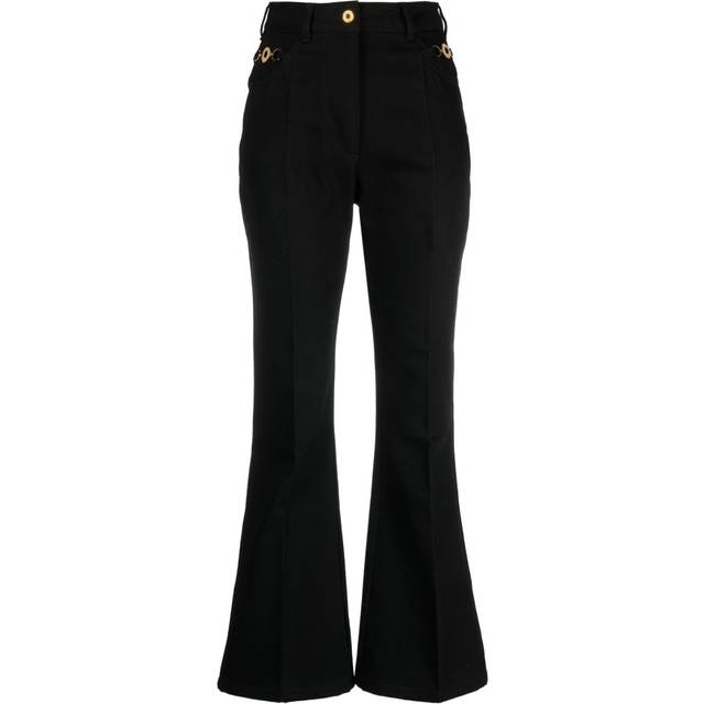 Patou - logo-embroidered flared jeans - women - Cotton - 42 - Black